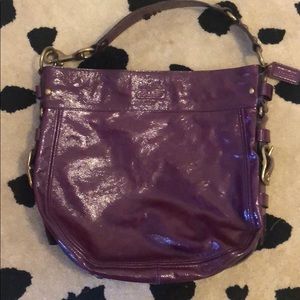 Coach patent leather cranberry colored purse